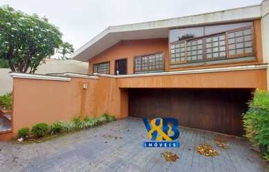 Imagem: A casa possui 5 Dormitórios, 3 Banheiros, 5 Vagas na garagem