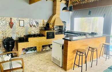 Imagem: A casa em condomínio possui 4 Dormitórios, 4 Banheiros, 3