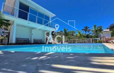 Imagem: A casa possui 2 Dormitórios, 3 Banheiros, 2 Vagas na garagem