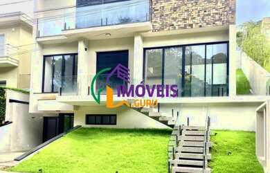 Imagem: A casa em condomínio possui 4 Dormitórios, 5 Banheiros, 4