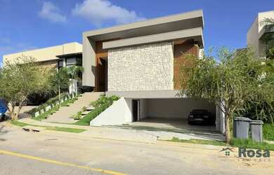 Imagem: A casa possui 3 Dormitórios, 5 Banheiros, 5 Vagas na garagem