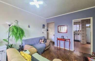 Imagem: O apartamento possui 2 Dormitórios, 1 Banheiro, 1 Vaga na garagem