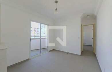 Imagem: O apartamento possui 1 Dormitório, 1 Banheiro, 1 Vaga na garagem