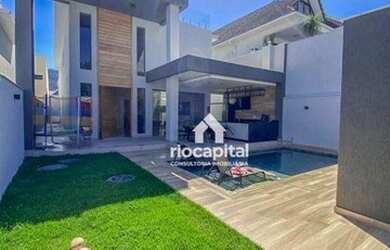 Imagem: A casa em condomínio possui 5 Dormitórios, 5 Banheiros, 2