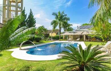 Imagem: A casa em condomínio possui 4 Dormitórios, 4 Banheiros, 5