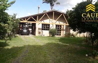 Imagem: A casa em condomínio possui 3 Dormitórios, 1 Banheiro e 595m²