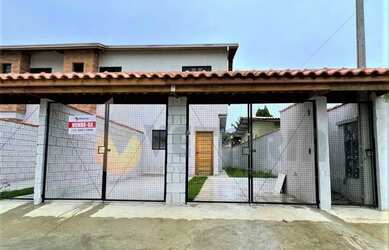 Imagem: A casa possui 2 Dormitórios, 3 Banheiros, 2 Vagas na garagem