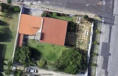 Imagem: A casa possui 4 Dormitórios, 5 Banheiros, 5 Vagas na garagem