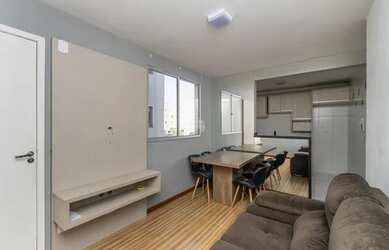 Imagem: O apartamento possui 2 Dormitórios, 1 Banheiro, 1 Vaga na garagem