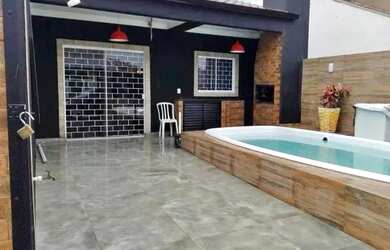 Imagem: A casa possui 2 Dormitórios, 1 Banheiro, 2 Vagas na garagem