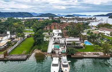 Imagem 5: CASA DE CANAL REFORMADA COM 3 VAGAS NÁUTICAS NO PORTO BRACUHY O NOVO ALTO PADRÃO DE ANGRA