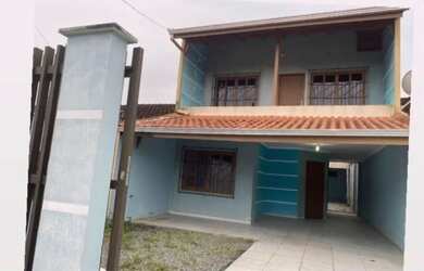 Imagem: A casa possui 3 Dormitórios, 3 Banheiros, 1 Vaga na garagem