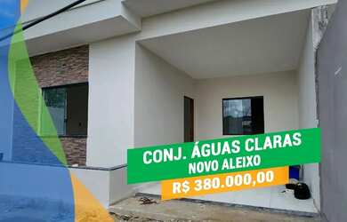 Imagem: A casa possui 3 Dormitórios, 2 Banheiros, 2 Vagas na garagem