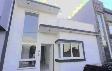 Imagem: A casa possui 3 Dormitórios, 3 Banheiros, 2 Vagas na garagem