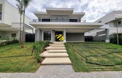 Imagem: A casa em condomínio possui 4 Dormitórios, 5 Banheiros, 4