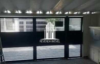 Imagem: A casa possui 4 Dormitórios, 5 Banheiros, 2 Vagas na garagem