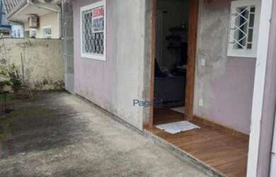 Imagem: A casa possui 2 Dormitórios, 2 Banheiros, 2 Vagas na garagem