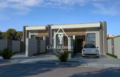 Imagem: A casa possui 2 Dormitórios, 2 Banheiros, 1 Vaga na garagem