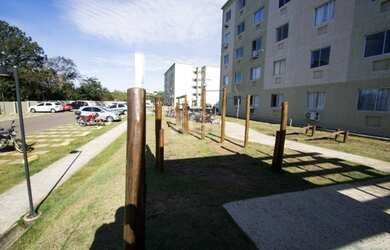 Imagem: O apartamento possui 2 Dormitórios, 1 Banheiro, 1 Vaga na garagem