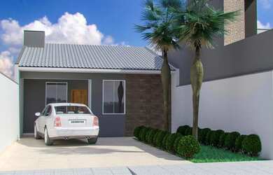 Imagem: A casa possui 3 Dormitórios, 2 Banheiros, 2 Vagas na garagem