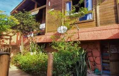 Imagem: A casa possui 5 Dormitórios, 3 Vagas na garagem, Churrasqueira