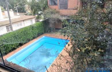 Imagem: A casa possui 3 Dormitórios, 5 Banheiros, 2 Vagas na garagem