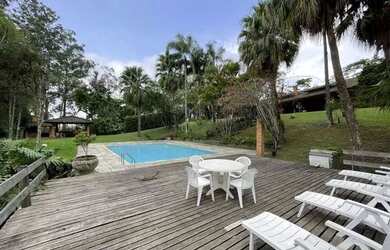 Imagem: A casa em condomínio possui 4 Dormitórios, 5 Banheiros, 5