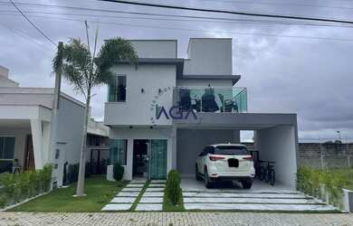 Imagem: A casa possui 4 Dormitórios, 4 Banheiros, 2 Vagas na garagem