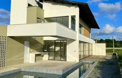 Imagem: A casa possui 4 Dormitórios, 4 Banheiros, 4 Vagas na garagem