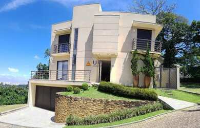 Imagem: A casa em condomínio possui 4 Dormitórios, 5 Banheiros, 5