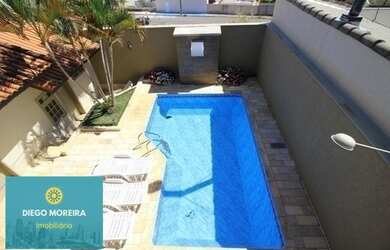 Imagem: A casa possui 3 Dormitórios, 5 Banheiros, 4 Vagas na garagem