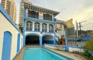 Imagem: A casa possui 5 Dormitórios, 5 Banheiros, 5 Vagas na garagem