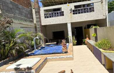 Imagem: A casa possui 2 Dormitórios, 3 Banheiros e está localizado