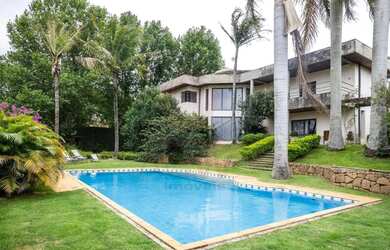 Imagem: A casa em condomínio possui 4 Dormitórios, 5 Banheiros, 5