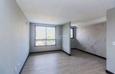 Imagem: O apartamento possui 2 Dormitórios, 1 Banheiro, 1 Vaga na garagem