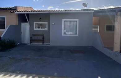 Imagem: A casa possui 2 Dormitórios, 1 Banheiro, 2 Vagas na garagem