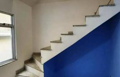 Imagem: A casa possui 3 Dormitórios, 2 Banheiros e 90m² de Área e