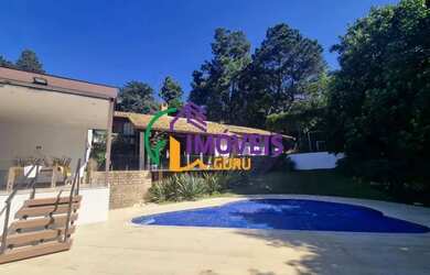 Imagem: A casa em condomínio possui 4 Dormitórios, 4 Banheiros, 2