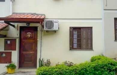 Imagem: A casa em condomínio possui 3 Dormitórios, 2 Banheiros, 1