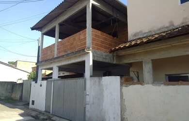 Imagem: A casa possui 2 Dormitórios, 2 Banheiros, 1 Vaga na garagem