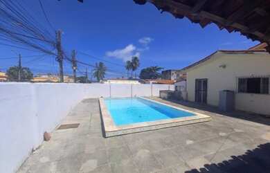 Imagem: A casa possui 5 Dormitórios, 4 Banheiros, 5 Vagas na garagem