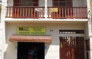 Imagem: A casa possui 2 Dormitórios, 1 Banheiro, 1 Vaga na garagem