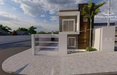 Imagem: A casa possui 3 Dormitórios, 2 Banheiros, 2 Vagas na garagem