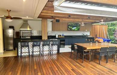 Imagem: A casa em condomínio possui 5 Dormitórios, 5 Banheiros, 4