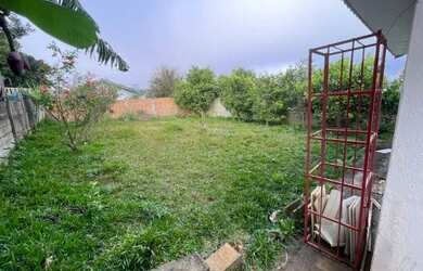 Imagem: A casa possui 2 Dormitórios, 1 Banheiro, 1 Vaga na garagem
