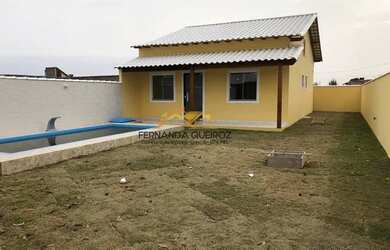 Imagem: A casa possui 2 Dormitórios, 2 Banheiros, 2 Vagas na garagem