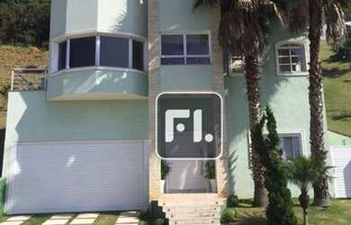 Imagem: A casa em condomínio possui 5 Dormitórios, 5 Banheiros, 5