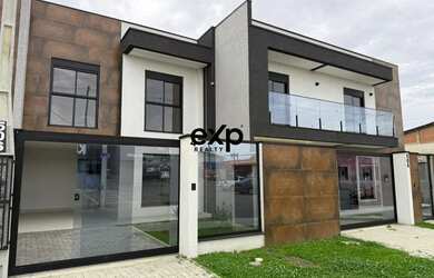 Imagem: A casa possui 3 Dormitórios, 3 Banheiros, 2 Vagas na garagem