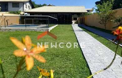 Imagem: A casa possui 3 Dormitórios, 3 Banheiros, 5 Vagas na garagem