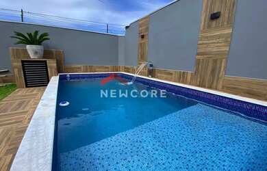 Imagem: A casa possui 3 Dormitórios, 3 Banheiros, 2 Vagas na garagem